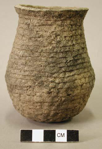 Ceramic vessel, corrugated, flared rim.