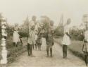 People carrying palm oil pots