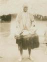 Man with oil drum