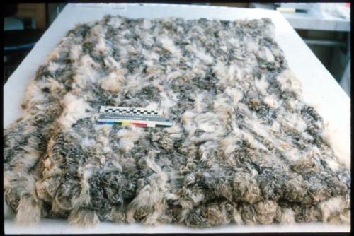 Rabbit skin blanket. Woven on vertical 2 bar frame.