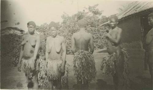 Basa women wearing widows costume for chief