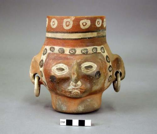 Head shaped vessel