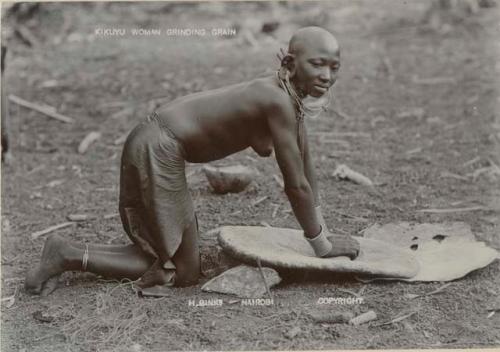 Woman grinding grain