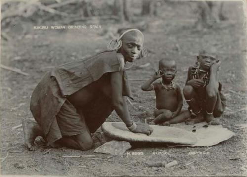 Woman grinding grain