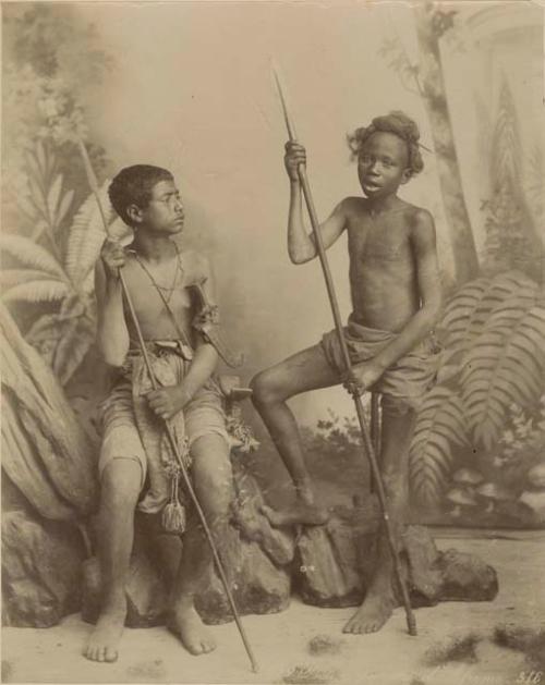 Studio portrait of two boy warriors