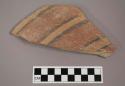 Ceramic body sherd with painted banding decoration on exterior