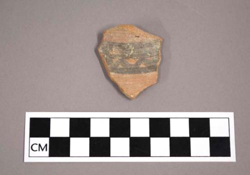 Ceramic body sherd with painted banding decoration on exterior