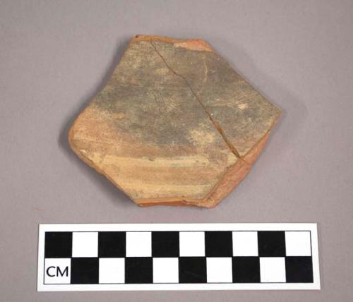 Ceramic body sherd with painted banded decoration on exterior