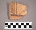 Ceramic body sherd with painted geometric design on exterior