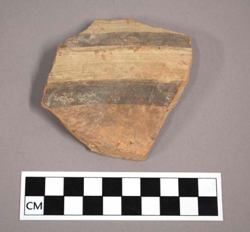 Ceramic body sherd with painted banded decoration on exterior