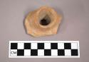 Ceramic sherd, unglazed circular spout