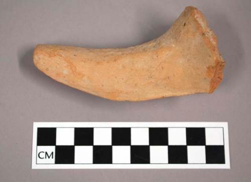 Ceramic sherd, long unglazed spout