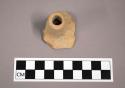 Ceramic sherd, unglazed circular spout