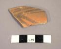 Ceramic body sherd with painted geometric design on exterior