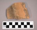 Ceramic body sherd with painted geometric design on exterior