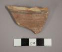 Ceramic body sherd with painted band on exterior