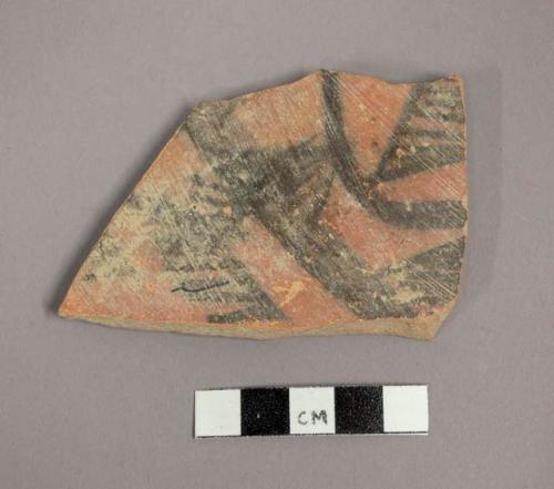 Ceramic body sherd with painted geometric design on exterior