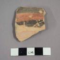 Ceramic body sherd with painted banding on exterior