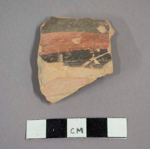 Ceramic body sherd with painted banding on exterior