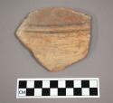 Ceramic body sherd with painted banded design on exterior