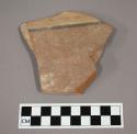 Ceramic body sherd with painted banded design on exterior