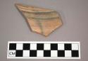 Ceramic body sherd with painted banded design on exterior