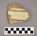 Ceramic body sherd with painted banded design on exterior