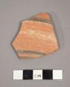 Ceramic body sherd with painted banded design on exterior