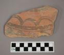 Ceramic body sherd with painted geometric design on exterior