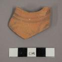 Ceramic body sherd with painted geometric design on exterior