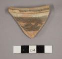 Ceramic rim sherd, curved with painted geometric design on exterior