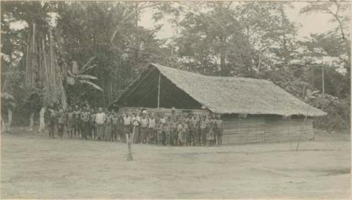 Large group in front of a school