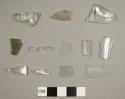 Eight colorless, four aqua, and one olive glass fragments, including one bottle lip, one molded rim, and one stemware base fragment