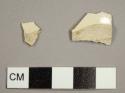 Creamware sherds, including one base sherd possibly from a bowl