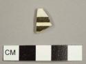 Annular ware rim sherd to unidentified vessel with brown stripes on one side and plain reverse