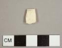 Creamware rim sherd from a hollowware vessel