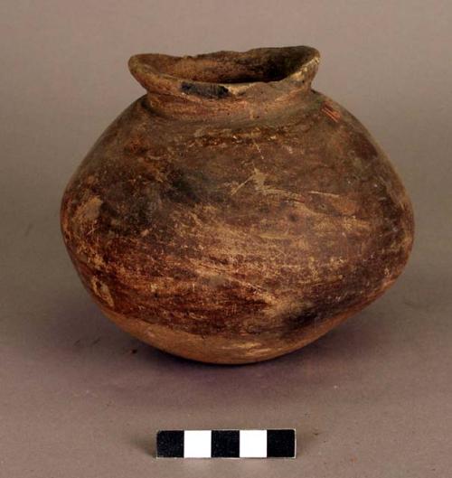 Earthen jar with lip