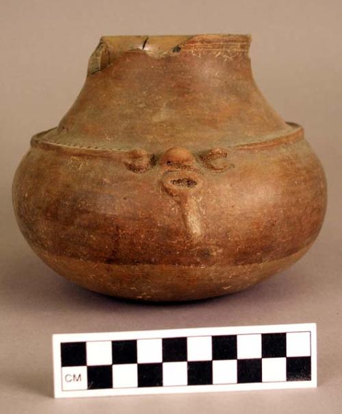 Pottery jar, human face