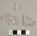 Colorless bottle glass fragments, including two base fragments from different vessels