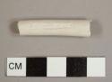 Kaolin/White ball clay pipe stem fragment with a 4/64-inch bore diameter and "SCD LAND" stamped on one side