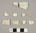 Pearlware sherds, including two plate footring fragments with a diameter of 10-cm that mend together
