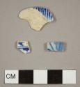 Blue transfer-printed pearlware sherds, including one plate rim sherd