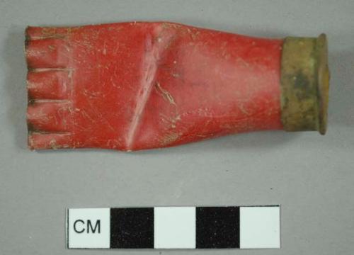 Red, spent shotgun shell