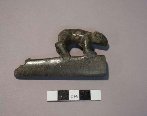 Ground stone, bear effigy pipe fragment