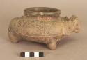 Earthen vase, incised