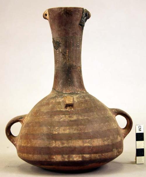 Vessel with a tall neck (mended)