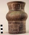 Carved pottery vase