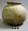 Tooled pottery jar