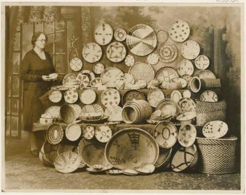 Woman with collection of baskets