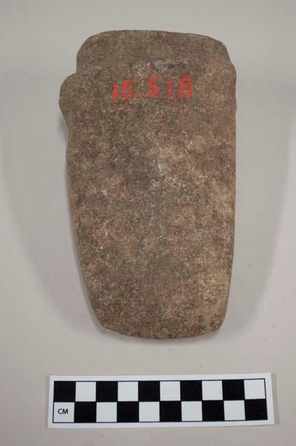 Ground stone grooved axe